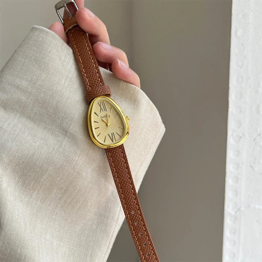 Montre élégante pour femme avec cadran serpent, mouvement à quartz et bracelet en cuir rouge - Montre femme stylée pour toutes les occasions